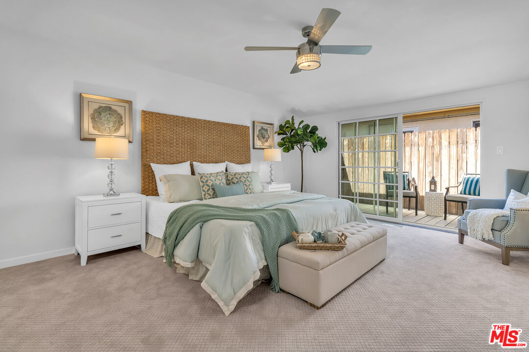 8330 Zitola Terrace Playa del Rey, CA 90293 - Photo 21 of 48 a spacious bedroom with a bed and a couch