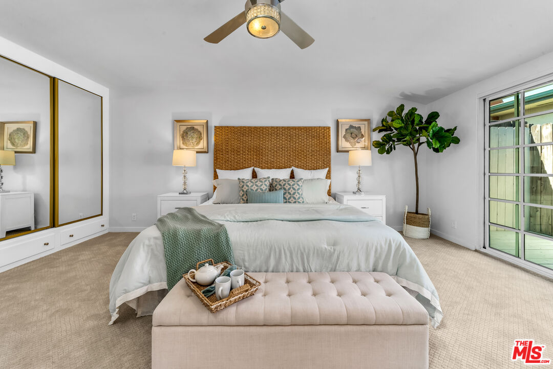 8330 Zitola Terrace Playa del Rey, CA 90293 - Photo 22 of 48 a bedroom with a bed and a potted plant