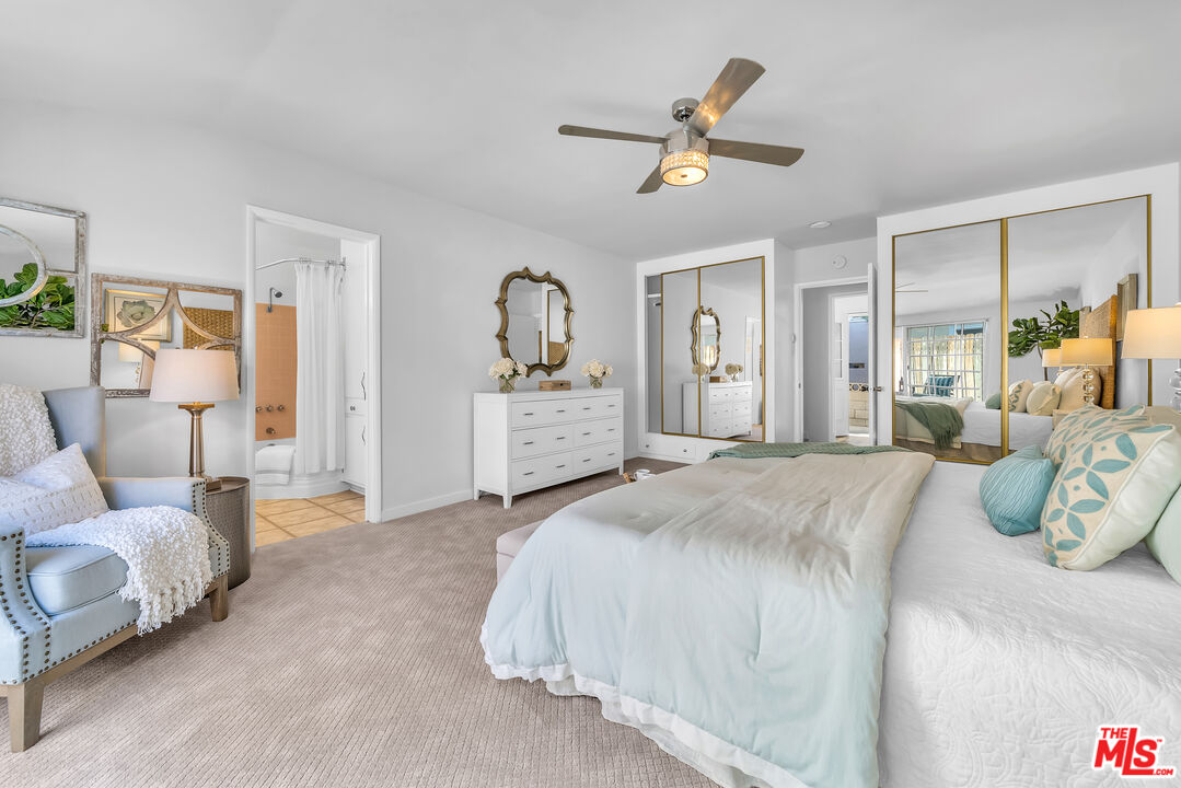 8330 Zitola Terrace Playa del Rey, CA 90293 - Photo 23 of 48 a spacious bedroom with a bed and ceiling fan