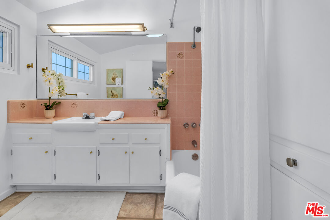 8330 Zitola Terrace Playa del Rey, CA 90293 - Photo 26 of 48 a bathroom with a sink and a mirror