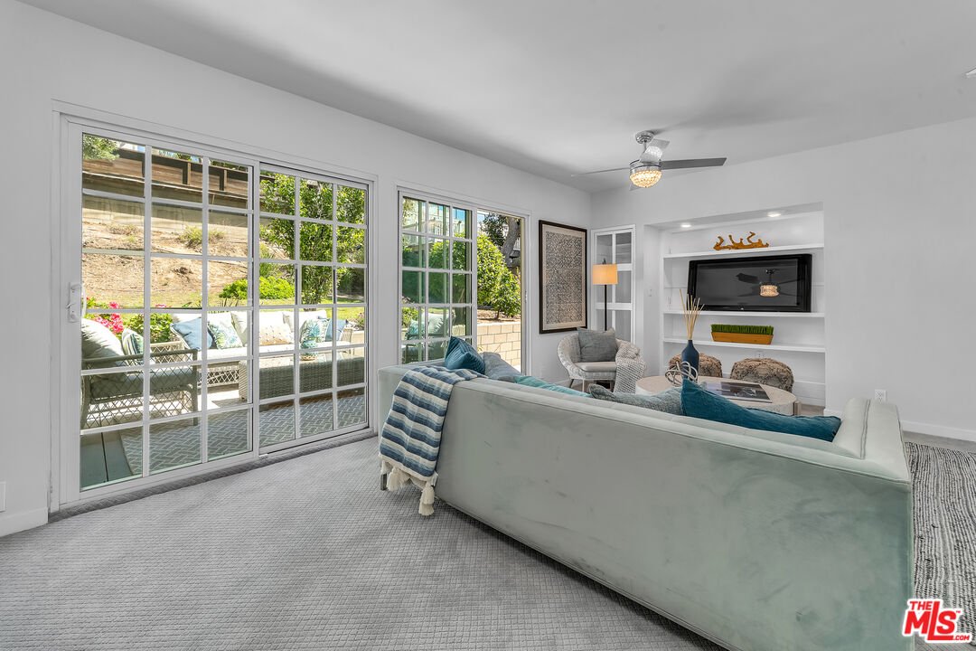 8330 Zitola Terrace Playa del Rey, CA 90293 - Photo 34 of 48 a living room with furniture and a flat screen tv