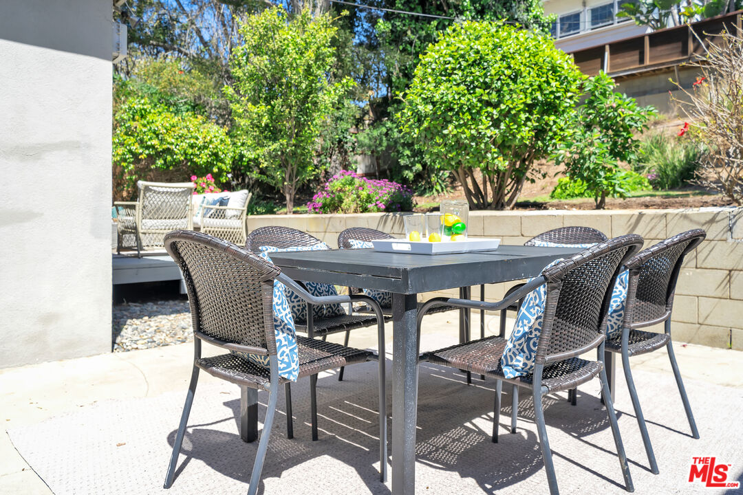 8330 Zitola Terrace Playa del Rey, CA 90293 - Photo 38 of 48 a view of an outdoor dining space with a table and chairs