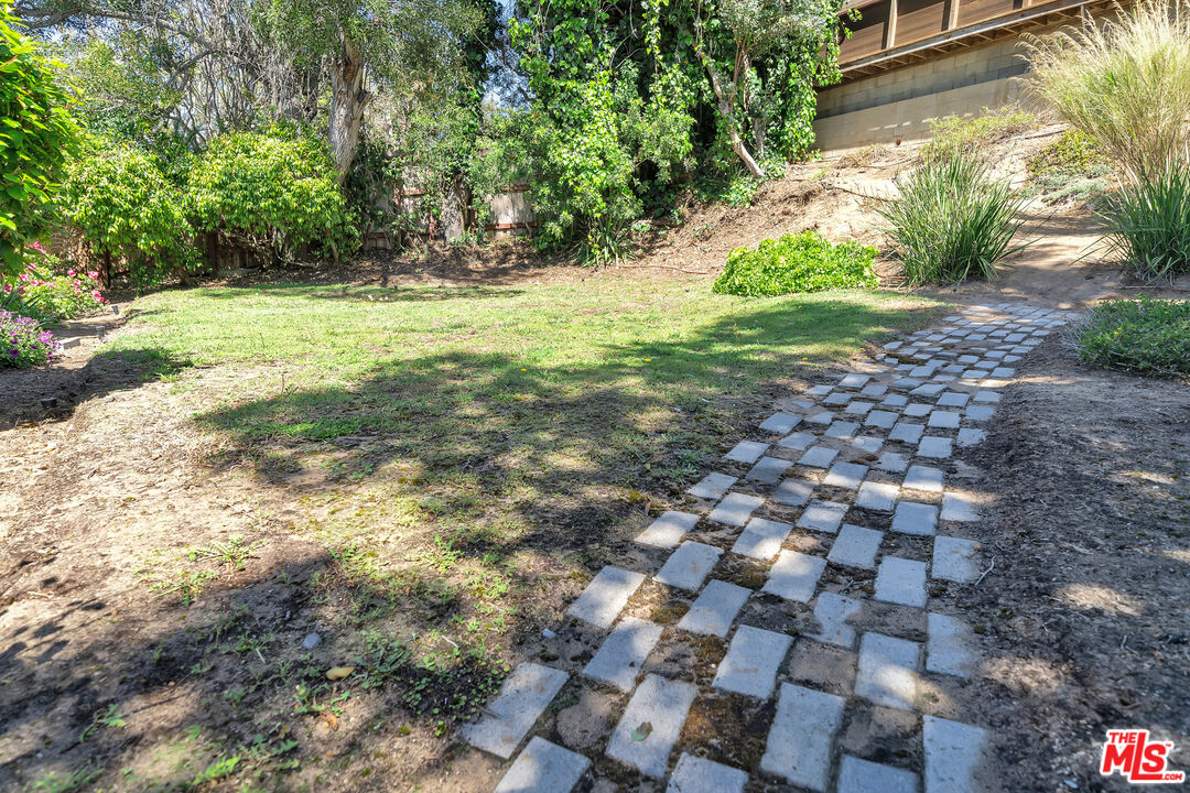 8330 Zitola Terrace Playa del Rey, CA 90293 - Photo 40 of 48 a view of a yard with plants and large trees