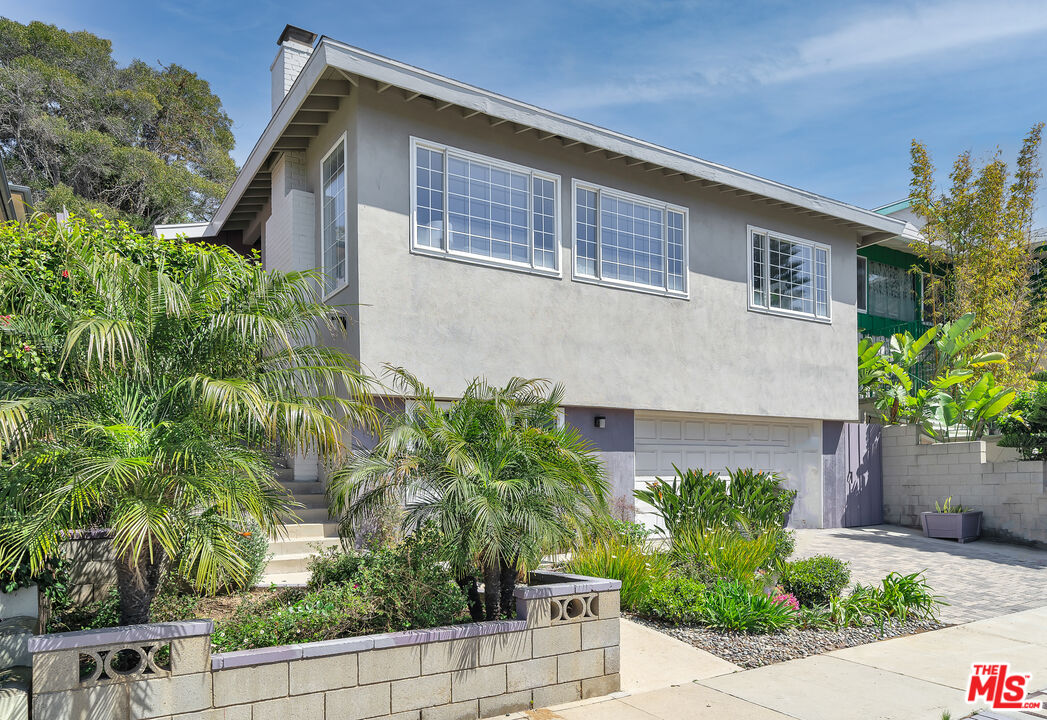 8330 Zitola Terrace Playa del Rey, CA 90293 - Photo 4 of 48 a front view of a house with plants