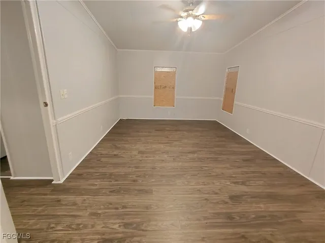 a kitchen with sink a refrigerator and a stove