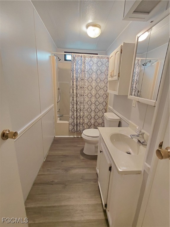 708 Bowden Road Clewiston, FL 33440 - Photo 15 of 44 a bathroom with a sink a toilet and shower