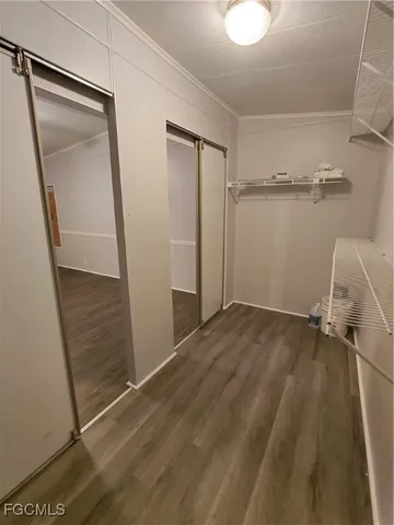 a view of entryway with wooden floor