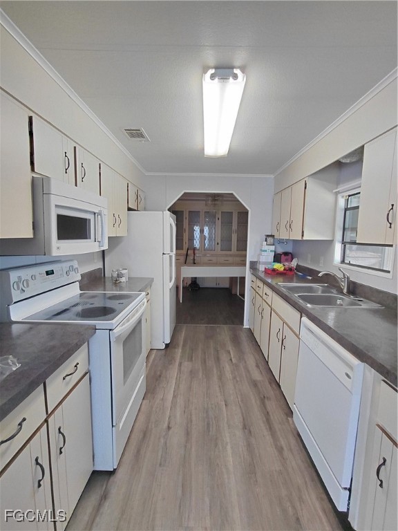 708 Bowden Road Clewiston, FL 33440 - Photo 25 of 44 a kitchen with stainless steel appliances granite countertop a sink stove and refrigerator
