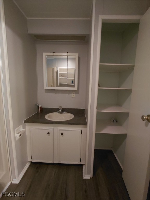708 Bowden Road Clewiston, FL 33440 - Photo 33 of 44 a utility room with granite countertop cabinets washer and dryer