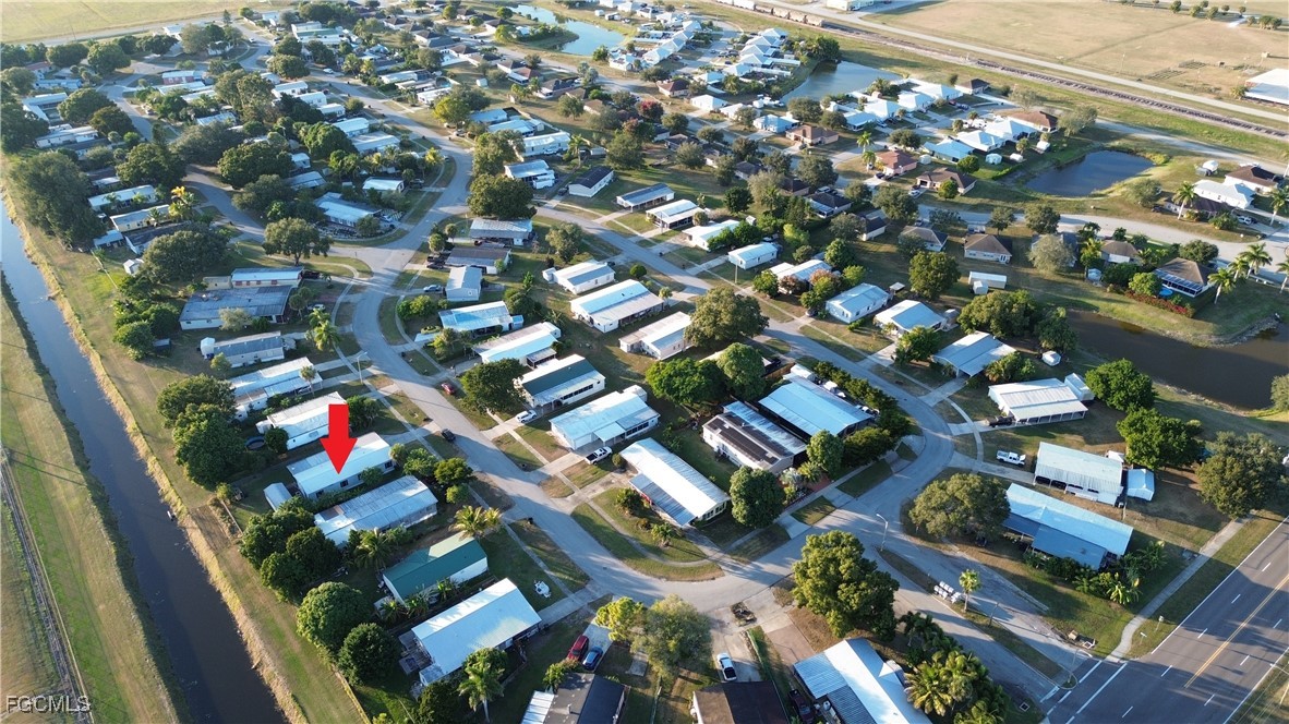 708 Bowden Road Clewiston, FL 33440 - Photo 41 of 44 an aerial view of residential houses with outdoor space