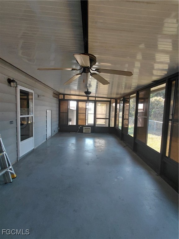 708 Bowden Road Clewiston, FL 33440 - Photo 10 of 44 a view of an empty room with a window