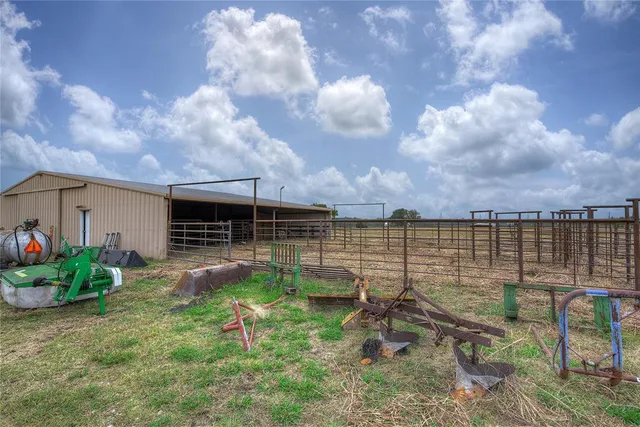a backyard of a house with lots of green space