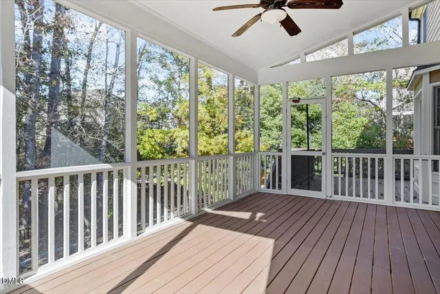 a view of a balcony with wooden floor