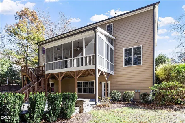 an aerial view of a house with a garden