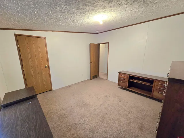 a view of livingroom with furniture and wooden floor