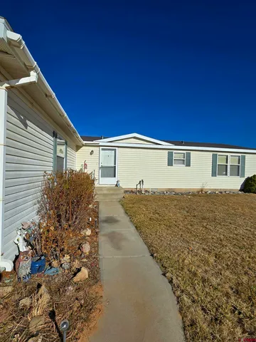 a view of a balcony with an outdoor space