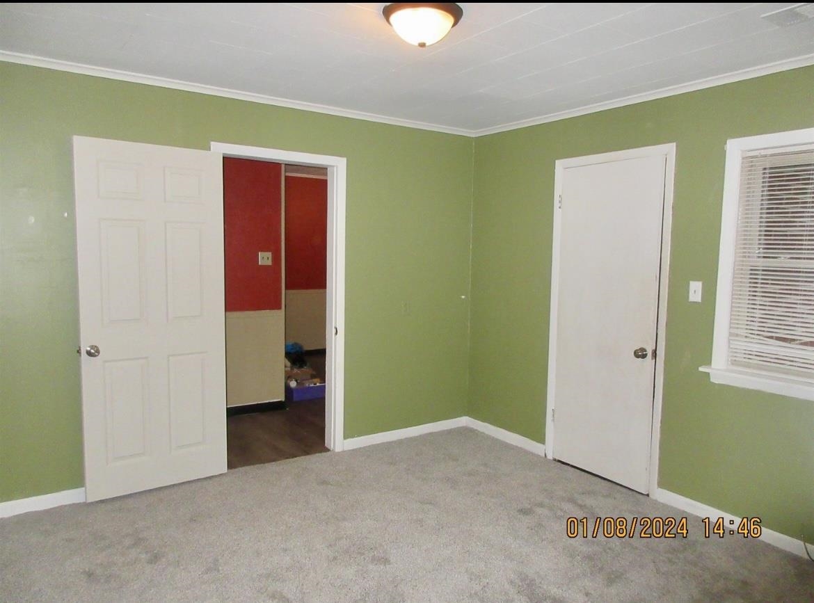 493 Perkins Street Ripley, TN 38063 - Photo 10 of 12 a view of a room with a hallway