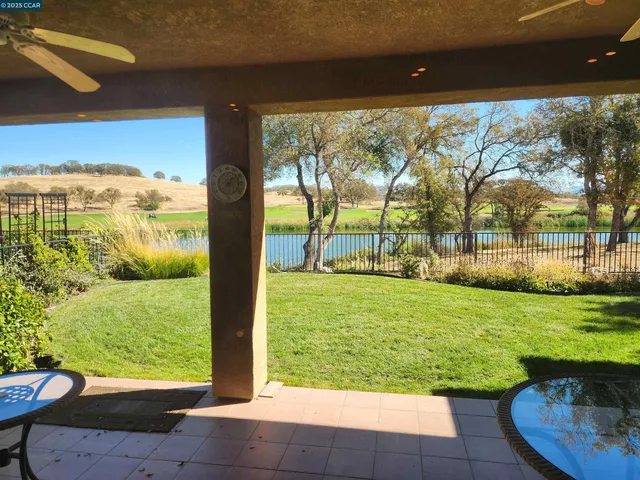a view of a back yard from a big room