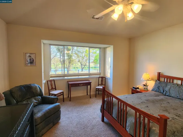 a bathroom with a double vanity sink and mirror