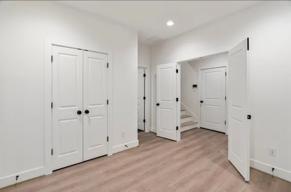 a view of a livingroom with wooden floor