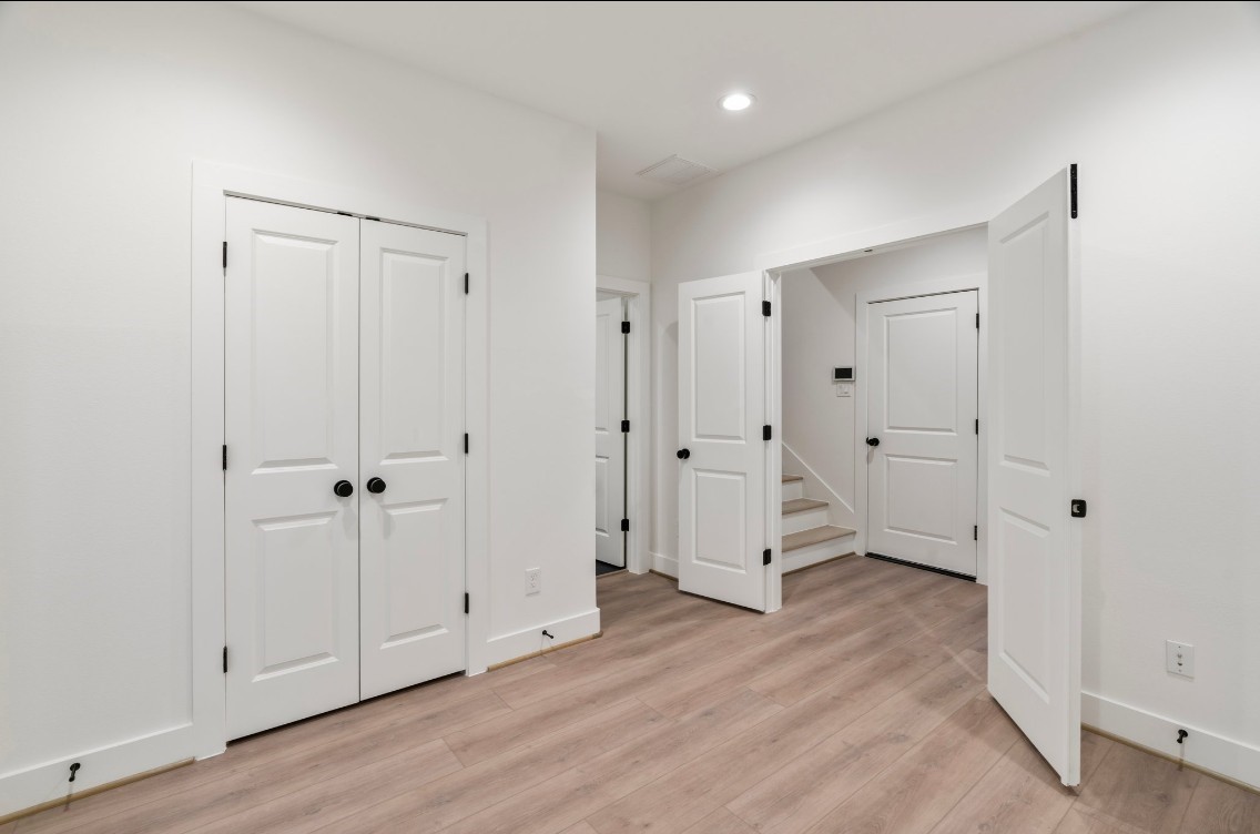 816 Curtin Street, Unit D Houston, TX 77018 - Photo 14 of 30 a view of a livingroom with wooden floor