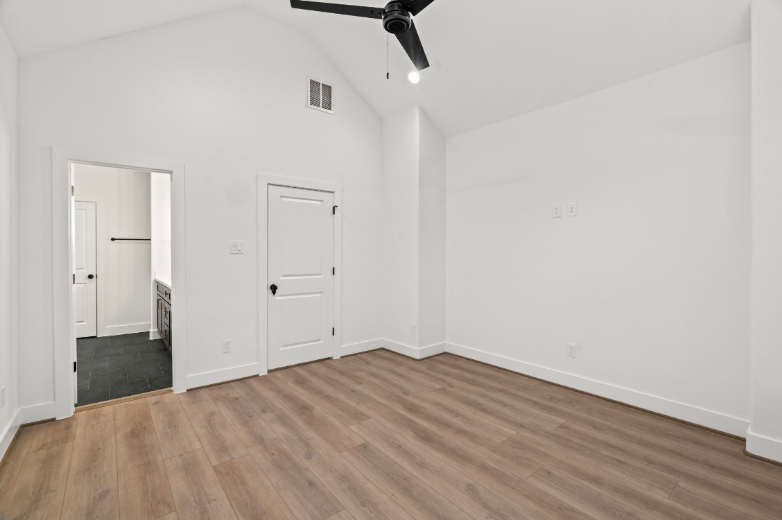 816 Curtin Street, Unit D Houston, TX 77018 - Photo 6 of 30 a view of empty room with wooden floor