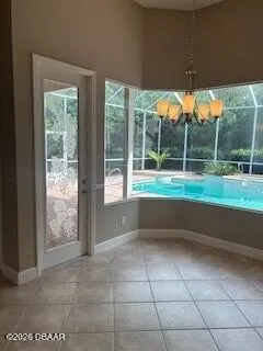 a view of room with window and outdoor view