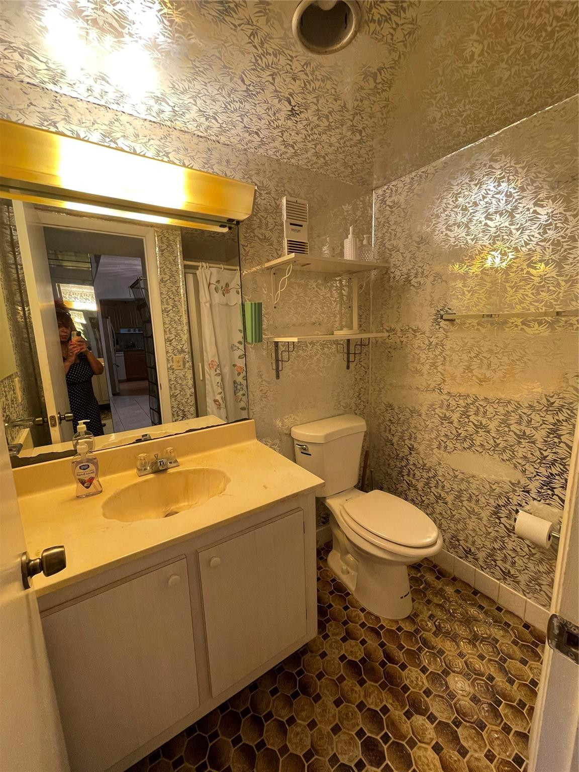 3490 Foxcroft Road, Unit B101 Miramar, FL 33025 - Photo 7 of 10 a bathroom with a granite countertop sink toilet and shower
