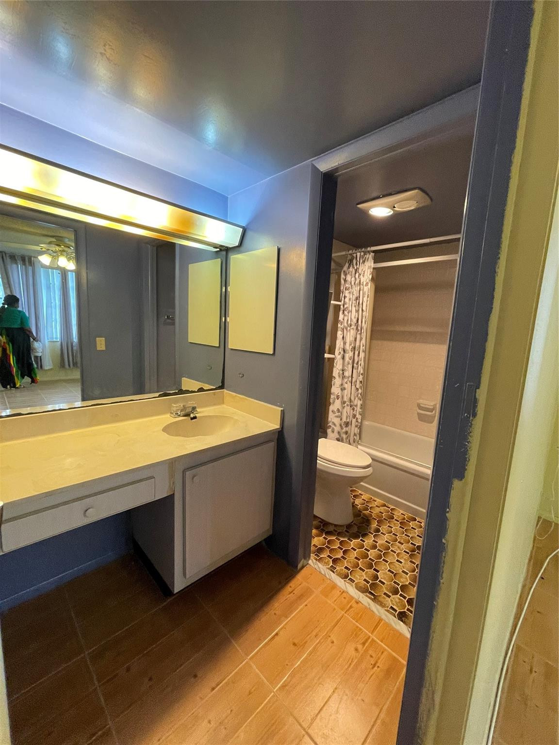 3490 Foxcroft Road, Unit B101 Miramar, FL 33025 - Photo 10 of 10 a bathroom with a tub sink and mirror