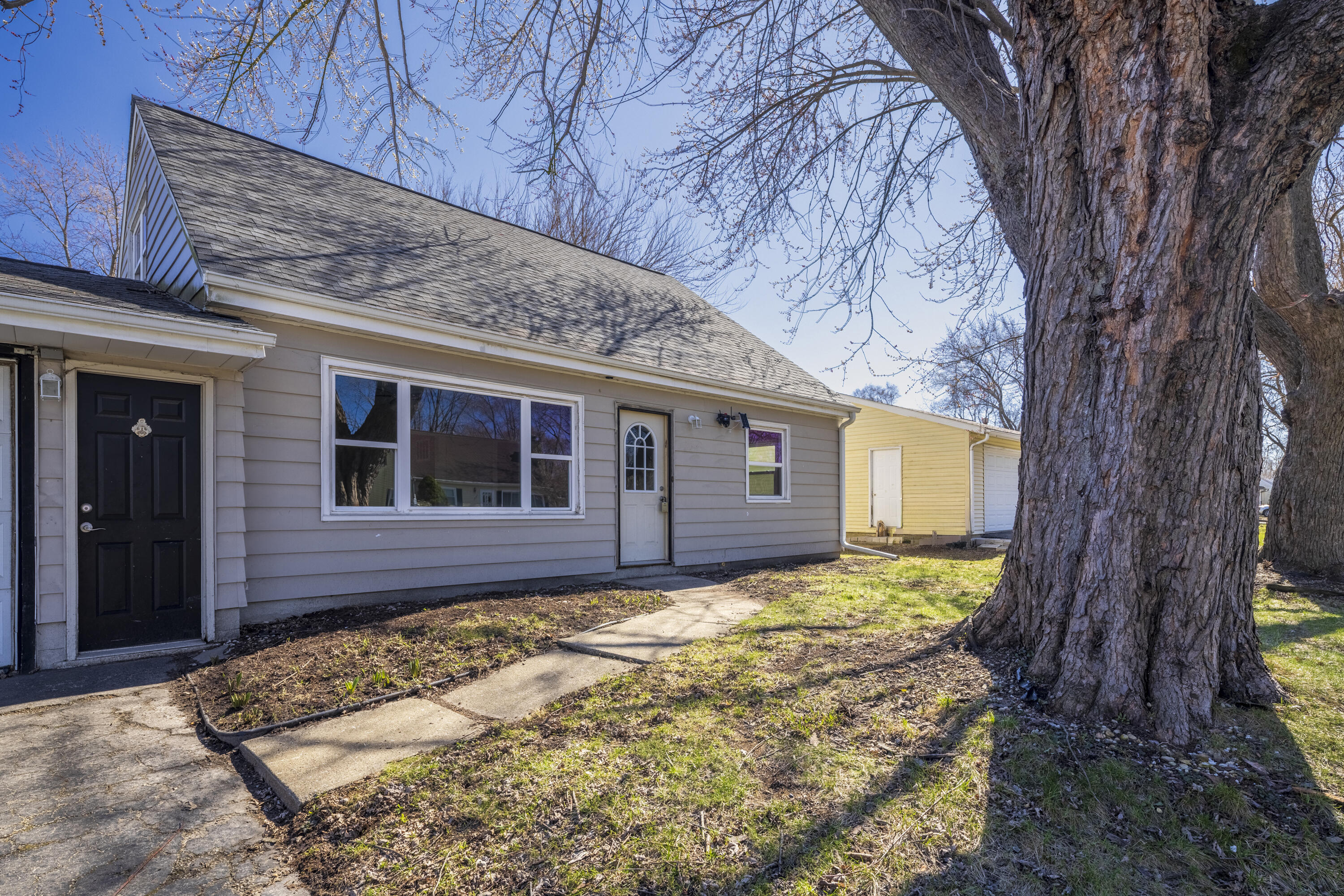 a front view of a house having yard