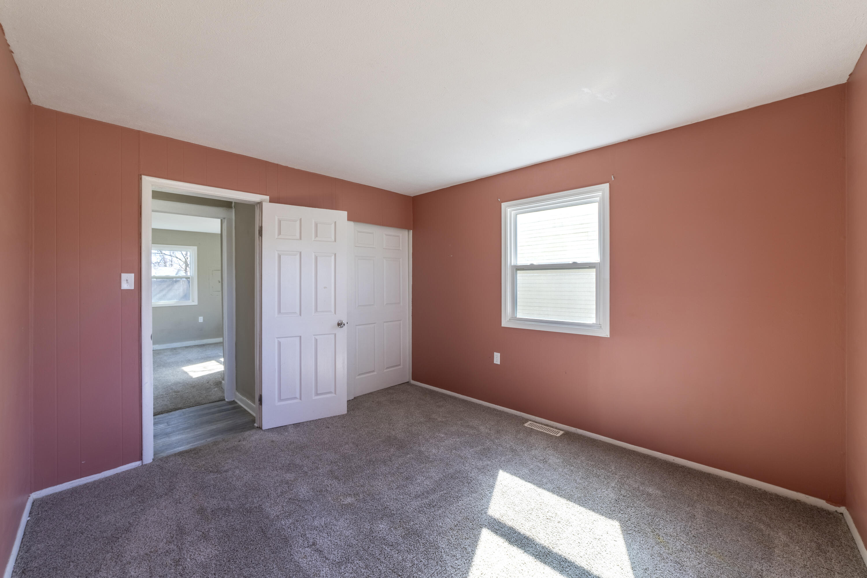 765 Governor Road Valparaiso, IN 46385 - Photo 12 of 26 an empty room with closet and windows