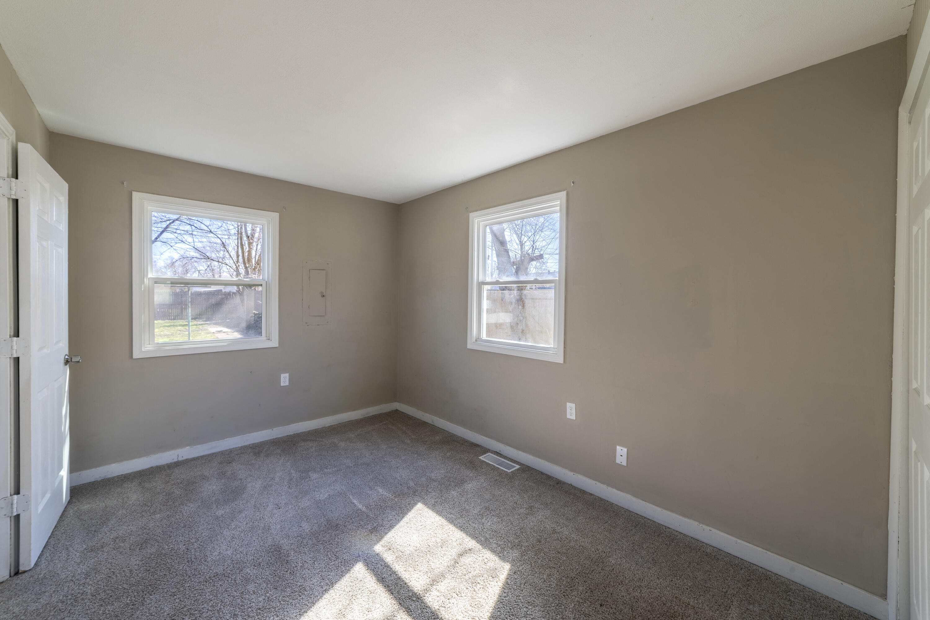 765 Governor Road Valparaiso, IN 46385 - Photo 10 of 26 a view of an empty room with a window