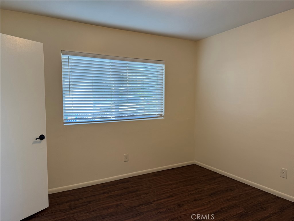 1353 Pengra Street Duarte, CA 91010 - Photo 13 of 18 a view of a small space with wooden floor and a window