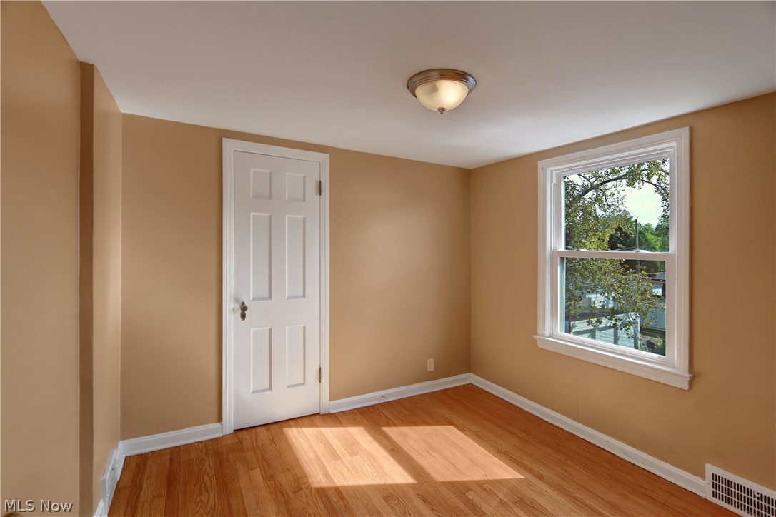 3665 Winchell Road Shaker Heights, OH 44122 - Photo 16 of 21 Third floor bedroom with hardwood floor