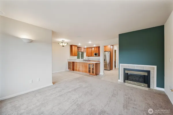 a view of a livingroom with a fireplace