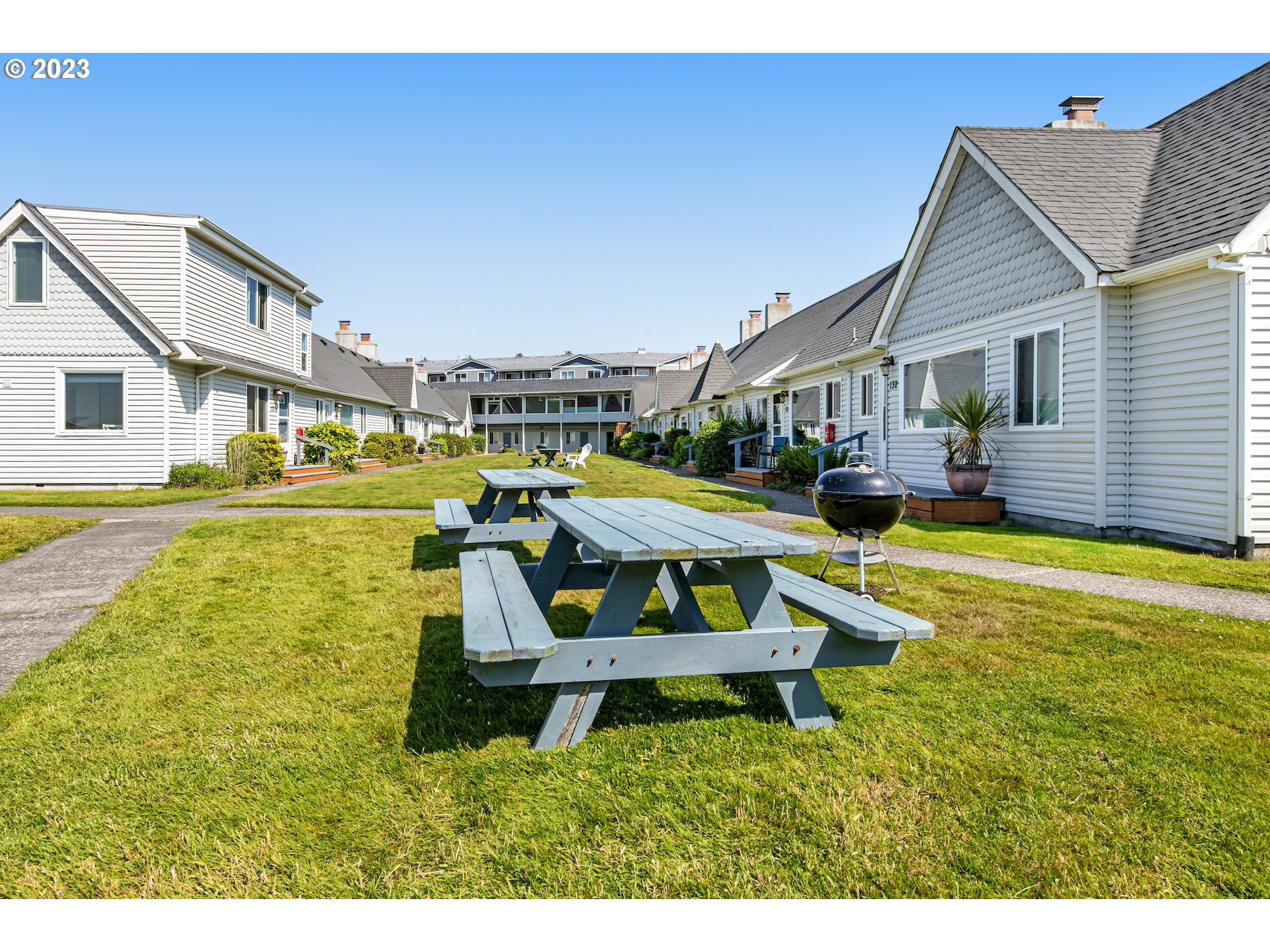 2316 Beach Drive, Unit 157 Seaside, OR 97138 - Photo 15 of 24 a house with swimming pool in front of it