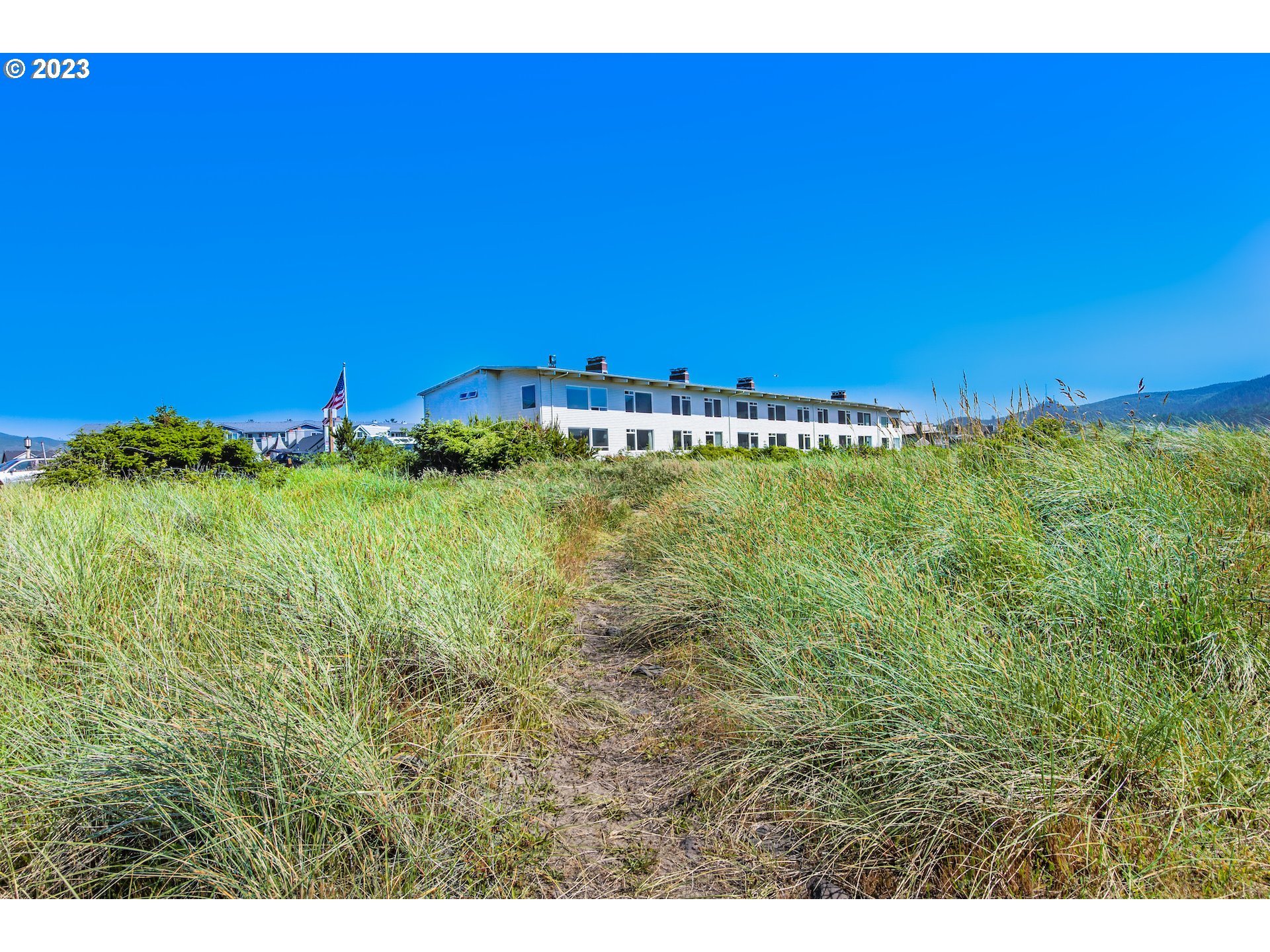 2316 Beach Drive, Unit 157 Seaside, OR 97138 - Photo 19 of 24 a view of a field with an ocean
