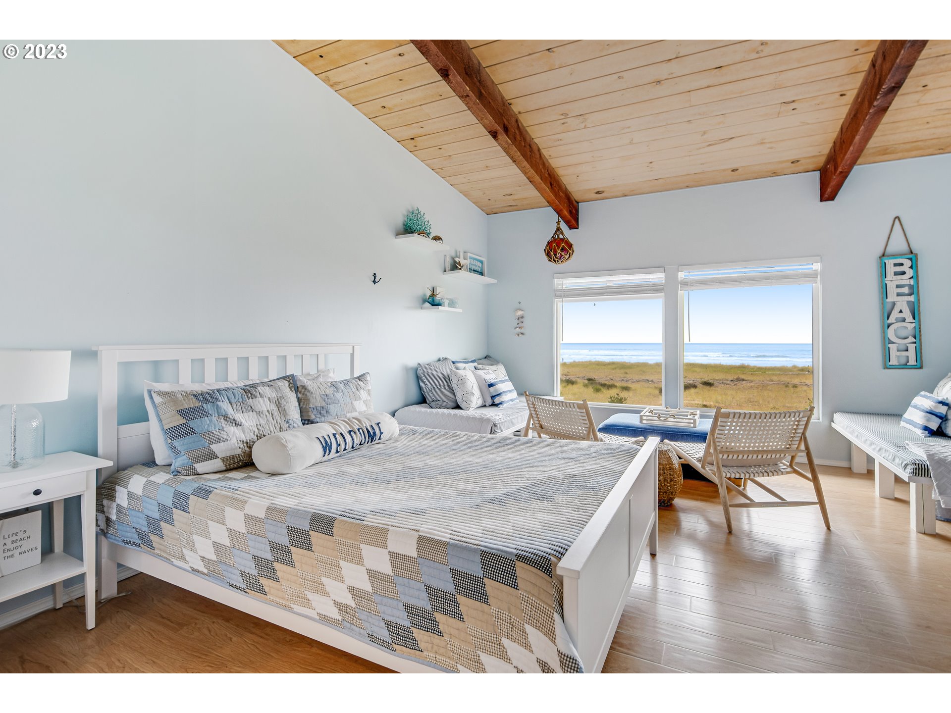 2316 Beach Drive, Unit 157 Seaside, OR 97138 - Photo 7 of 24 a living room with furniture and a wooden floor
