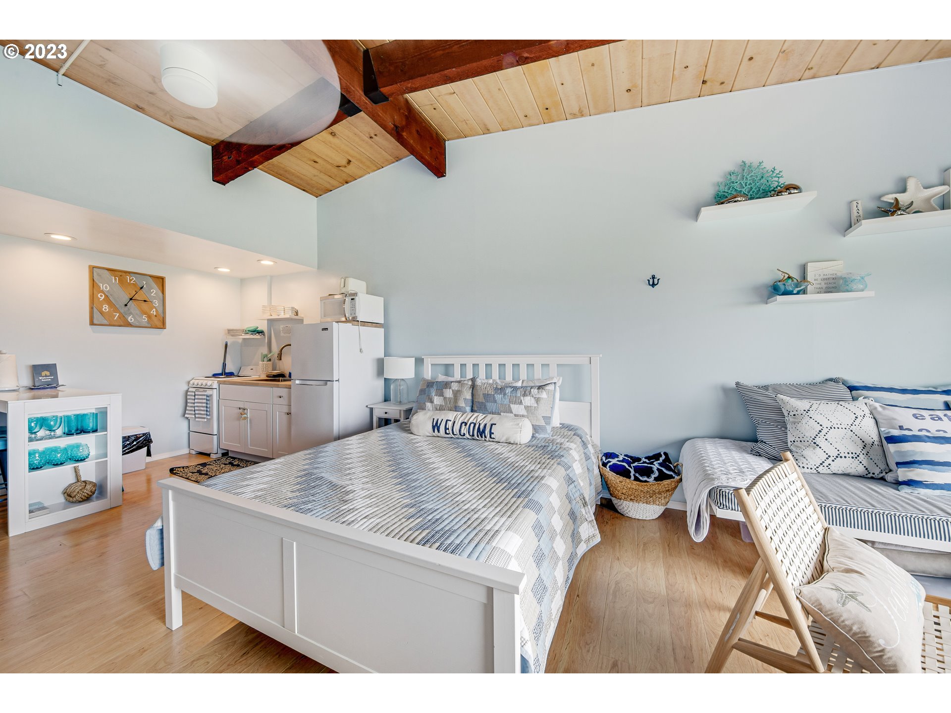 2316 Beach Drive, Unit 157 Seaside, OR 97138 - Photo 8 of 24 a living room with furniture and kitchen view