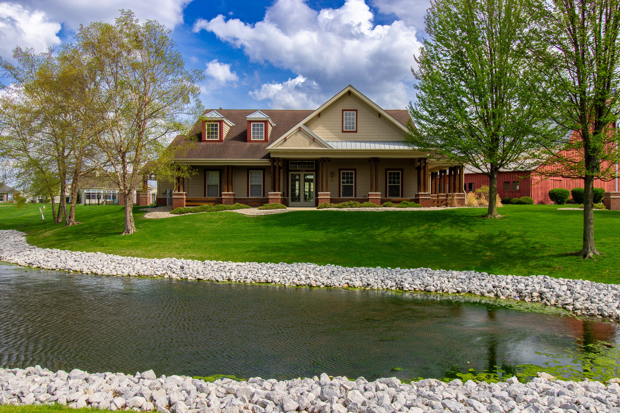 11677 Maryland Street Crown Point, IN 46307 - Photo 12 of 31 a front view of a house with a lake view