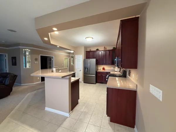 a kitchen with a sink and cabinets
