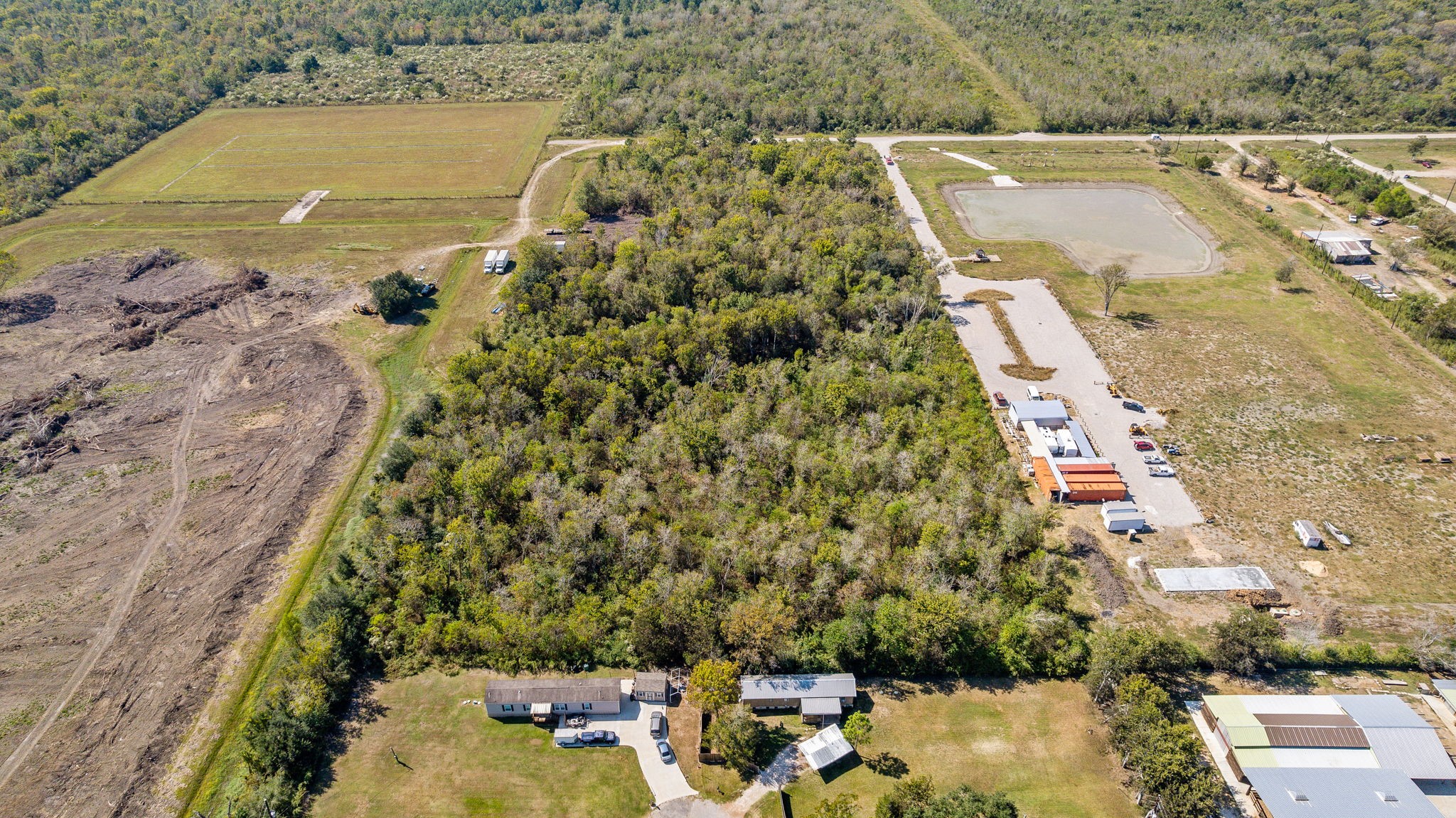 0 Apollo Lane Rosharon, TX 77583 - Photo 5 of 7 an aerial view of a house with a lake view