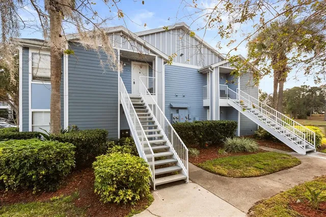 a view of a house with a garden