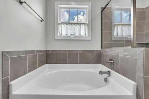 a bathroom with a bathtub