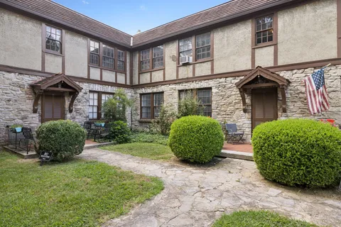 an aerial view of residential house with outdoor space