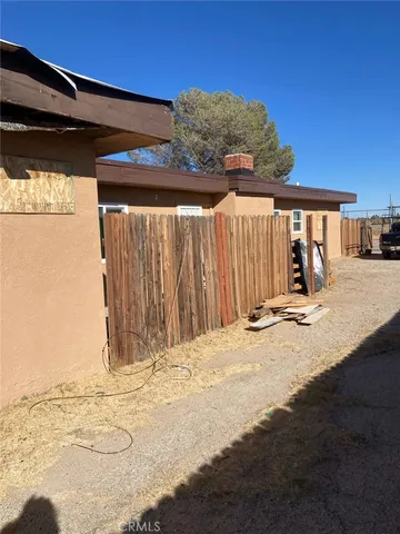 a view of a backyard of a house