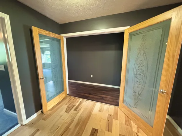 a workspace with furniture and rug