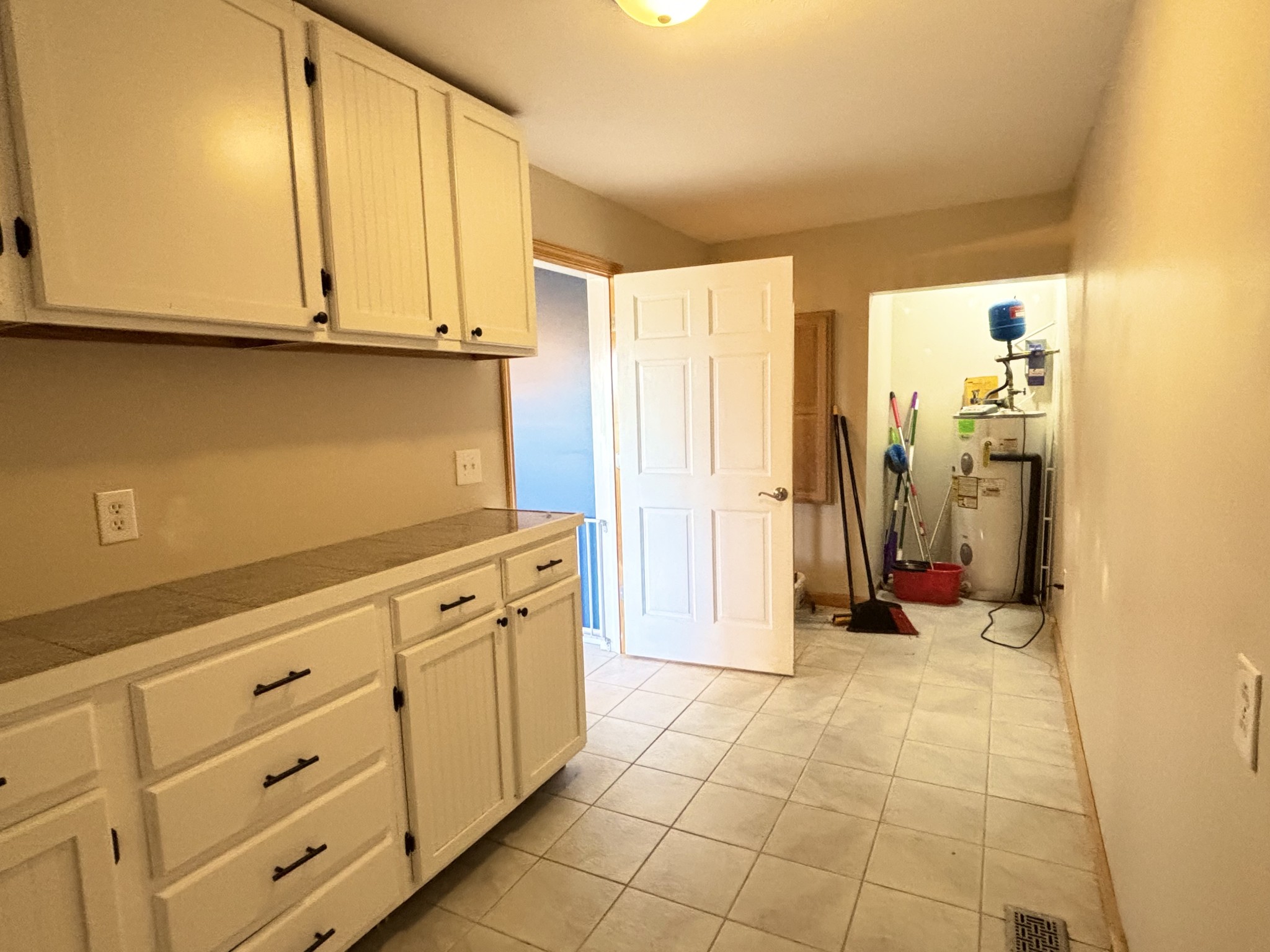 545 Adams Store Poole Mill Road Crofton, KY 42217 - Photo 35 of 48 a view of a kitchen with cabinet and mirrors