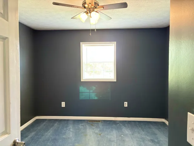 a workspace area with wooden floor