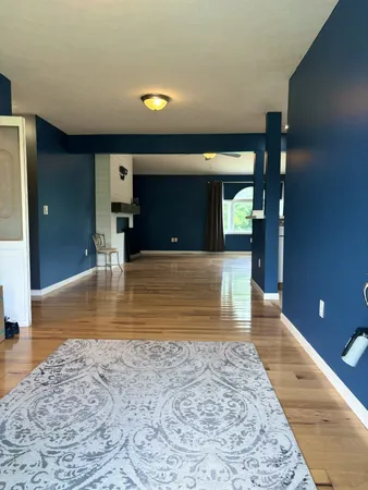 a view of a living room and bathroom